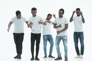 Fototapeta premium in full growth. a group of dancing guys in white t-shirts