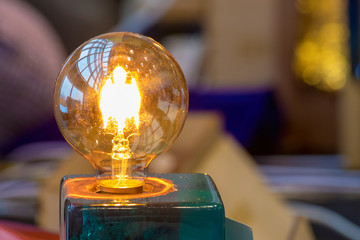 Edison lamp with a little shining electrical angel inside the bulb. Little miracle.