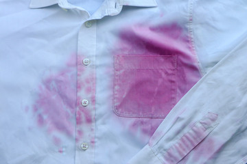 Fototapeta premium Dirty shirt with wine spots, close up