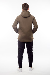 Man wearing in khaki hoodie isolated on white background. Back view.