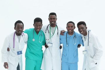 multinational group of doctors and interns standing together.