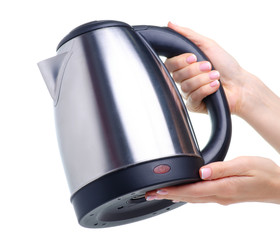 Metal silver electric kettle in hand on white background isolation