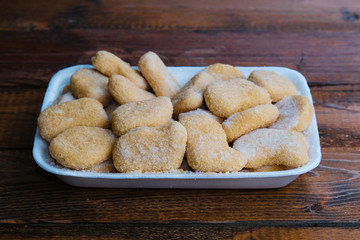 chicken nuggets composition on a wooden background