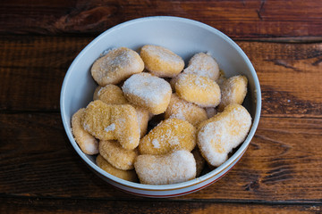 chicken nuggets composition on a wooden background