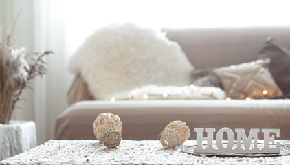 Still life in the living room with the inscription home.