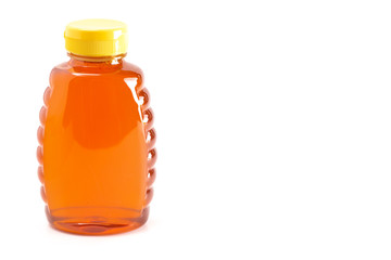 Jar of Raw Natural Honey Isolated on a White Background