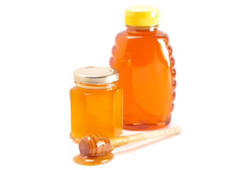Jars of Raw Natural Honey on a White Background