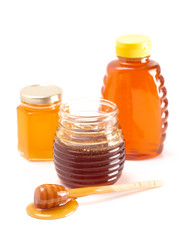 Jars of Raw Natural Honey on a White Background