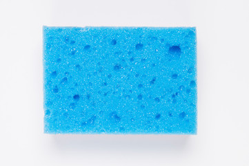 blue sponge for washing on a white background