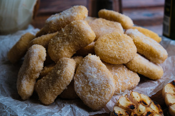 chicken nuggets composition on a wooden background