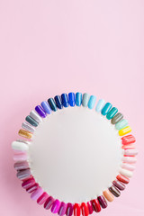 The color of Polish for manicure. Design for nails. testers nail Polish. Fashion manicure. Shiny gel lacquer. Feminine nail art. Nail art design wheel. Collection of nails color polish samples.Copy