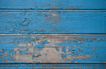 Fototapeta na wymiar Blue painted shabby wooden plank surface