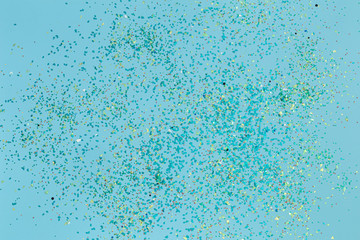 Beautiful blue holiday background with colored sequins