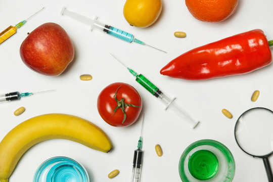 Genetically Engineered Food Concept, Fruits And Vegetables Flat Lay With Syringes And Needles,problem Of Toxins In Food 