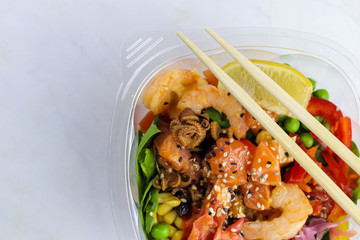 Tasty Hawaiian poke bowl  on light background