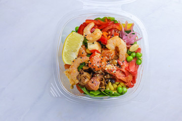 Tasty Hawaiian poke bowl  on light background