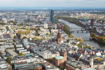 Fototapeta na wymiar Panoramic view from observation point from Main Tower to Frankfurt and suburbans, Germany