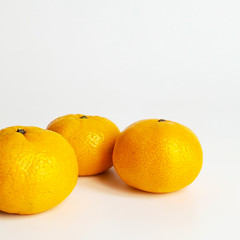 Juicy ripe Mandarin, citrus fruit isolated on a white background, close-up.