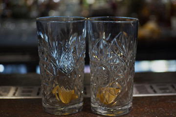 Two glasses with orange in it