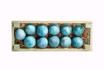 Easter eggs in a box isolated on a white background