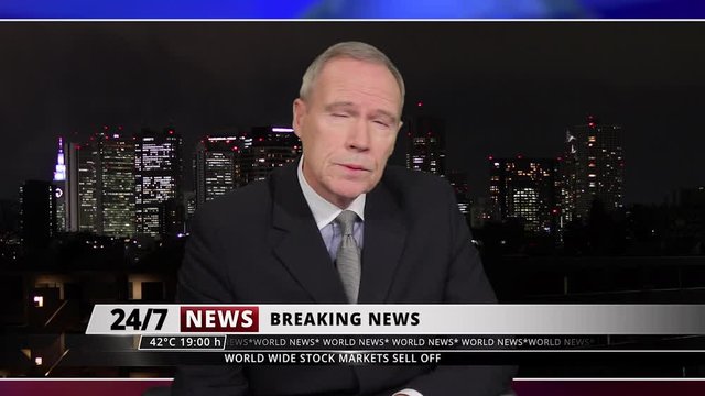MS Senior male presenting breaking news live from television studio