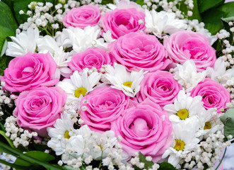 beautiful bouquet with different flowers, roses and chrysanthemums