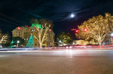 View of Downtown Georgetown Texas With Full Moon in the Night Sky
