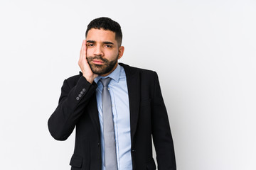 Young latin business woman against a white background isolated who is bored, fatigued and need a relax day.
