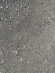 Wet grey sand texture
