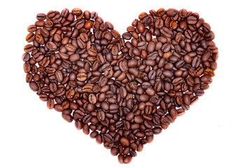 roasted coffee beans laid out in the shape of a heart on a white background. I like coffee.