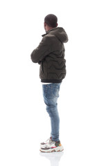 Fototapeta premium side view. casual guy in jeans looking at copy space