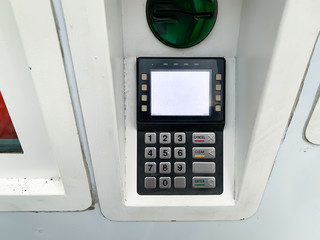 Parking payment terminal on the city street close up, modern technology for payment using credit card