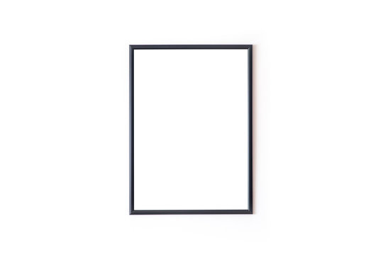 Blank black square frame in front of white wall 