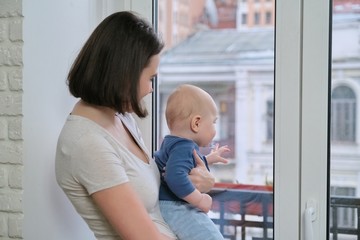 Portrait of young beautiful mother and toddler son