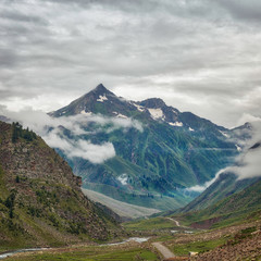 Fototapeta premium Low hanging clouds along the Karakoram Highway in northern Pakistan, taken in August 2019