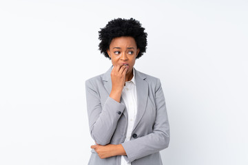 African american business woman over isolated white background nervous and scared