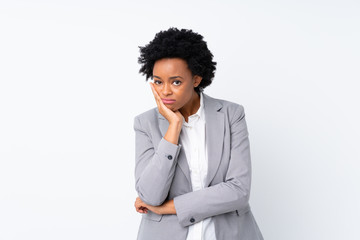 African american business woman over isolated white background unhappy and frustrated