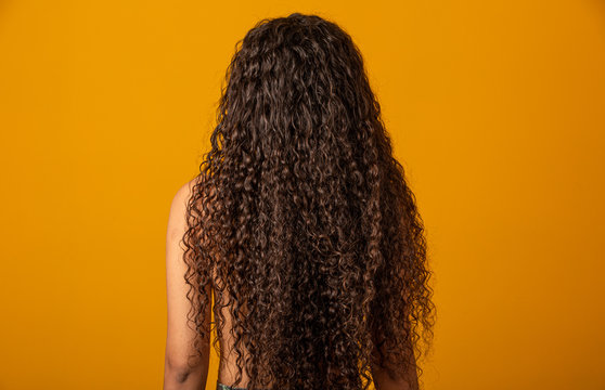 Portrait of beautiful hair black woman .
