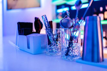 cocktail preparation tools in nightclub