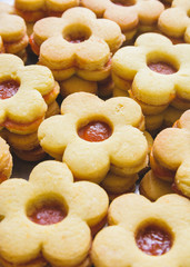 Flower shaped homemade cookies filled with jam