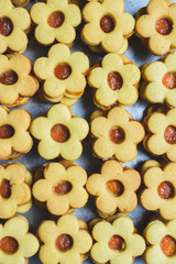 Flower shaped homemade cookies filled with jam