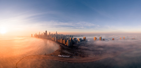 Fototapeta na wymiar Chicago foggy aerial panorama with Lake Michigan and North ave beach