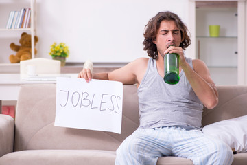 Unemployed man desperate at home