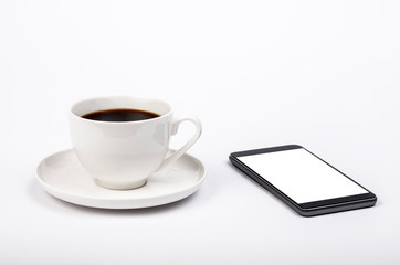 Fototapeta na wymiar cup of coffee and smartphone
