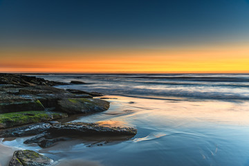 Sunrise Seascape with Soft Cloud on the Horizon