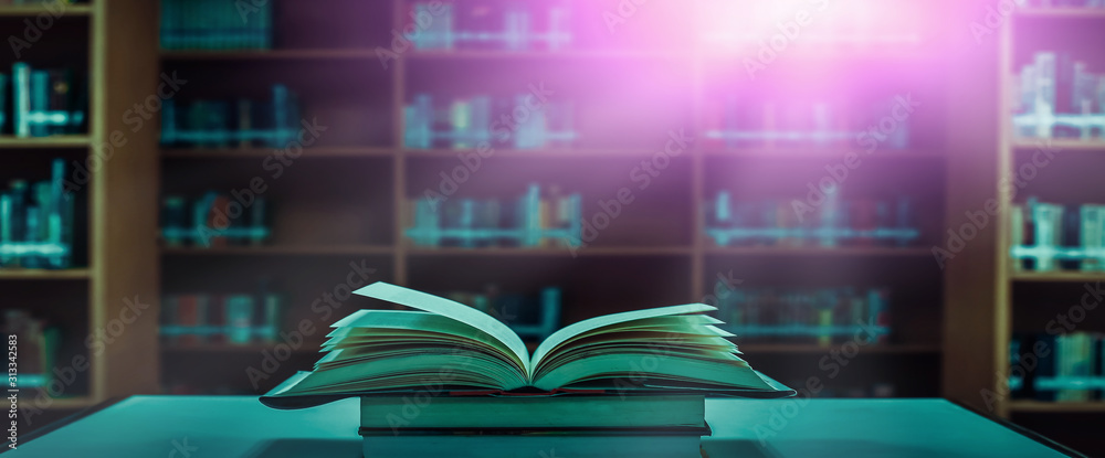 Poster stack of books in the library and blur bookshelf background