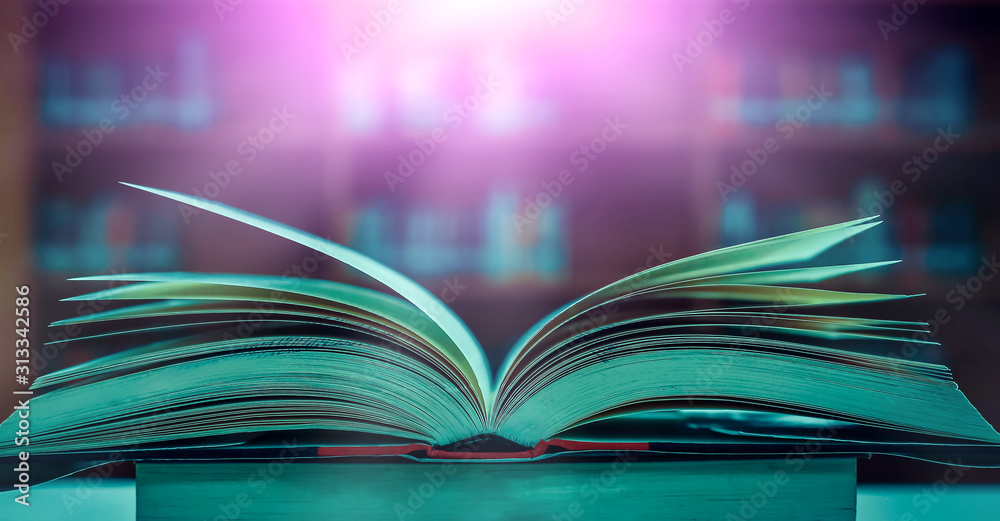 Poster stack of books in the library and blur bookshelf background
