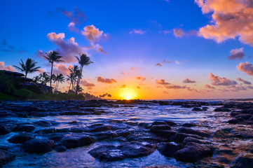 Fototapeta na wymiar Sunrise over the coast of Kauai, Hawaii,