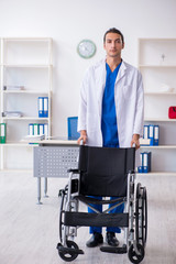 Young male doctor working in the clinic