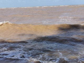 waves crashing on rocks